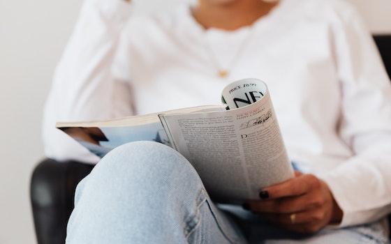 woman reading a magazine