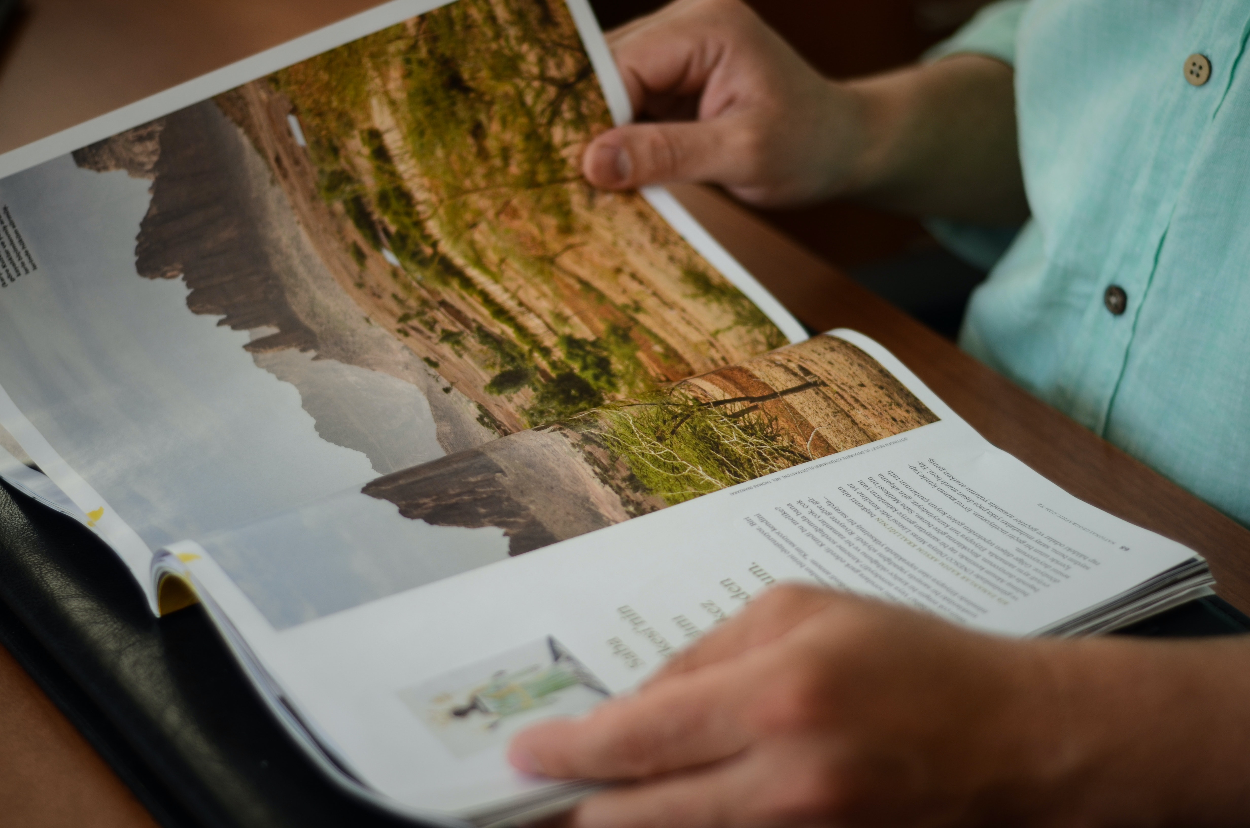 man reading article